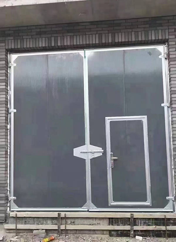 乾县工业平开门在大型设备制造车间的应用实例